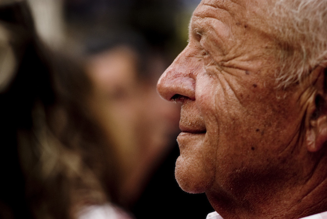 Photograph of Tanned Old Man Smiling