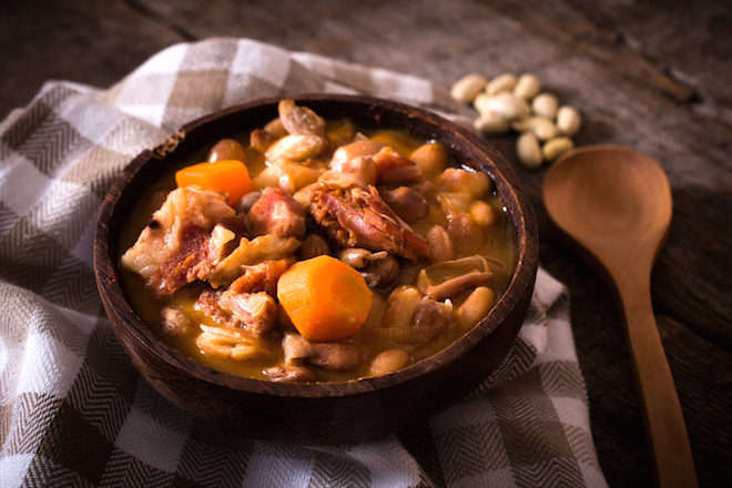Prepared beans and beef meat in a rustic bowl