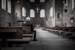 Man sitting in church alone