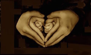 Hands surrounding each other forming hearts