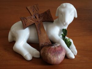 Lamb carrying a cross