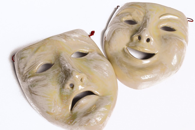 A pair of masks showing comedy & tragedy.
