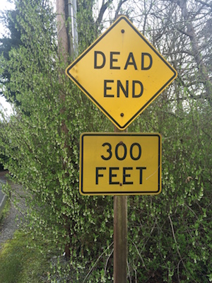 A sign post that reads "Dead End".