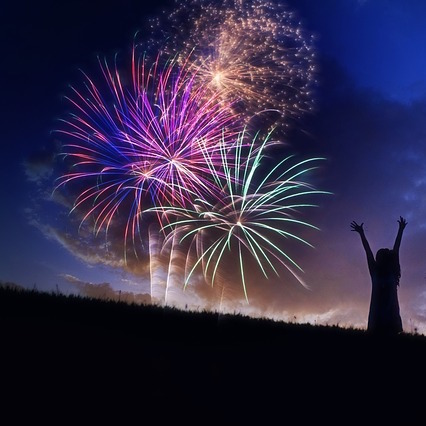 Celebrating with fireworks.