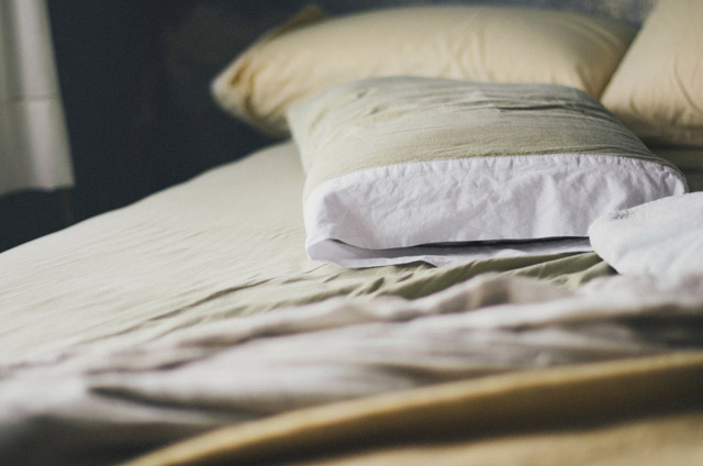 Pillows on a bed.