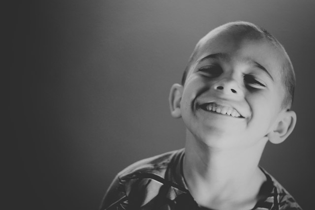 A smiling boy.