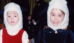 Kara Roberts and her friend Emily as children, dressed up as Christmas sheep